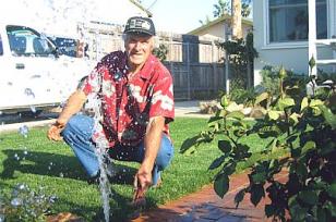 Jack is on a sprinkler repair in Woodland fixing a broken head